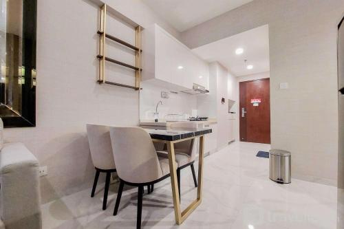 Scenic and Restful 2BR Sky House BSD Apartment By Travelio