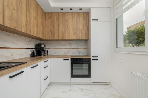 keuken, Green Wheel Apartment - Świnoujście Centrum - by Rent like home (Green Wheel Apartment - Swinoujscie Centrum - by Rent like home) in Swinoujscie City Center keuken, Green Wheel Apartment - Świnoujście Centrum - by Rent like home (Green Wheel Apartment - Swinoujscie Centrum - by Rent like home) in Swinoujscie City Center