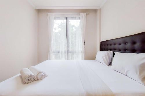 Modern Look 1BR at Asatti Apartment By Travelio