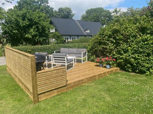 Erkély/terasz, Gästhus i lummig trädgård (Gasthus i lummig tradgard) in Loderup Erkély/terasz, Gästhus i lummig trädgård (Gasthus i lummig tradgard) in Loderup