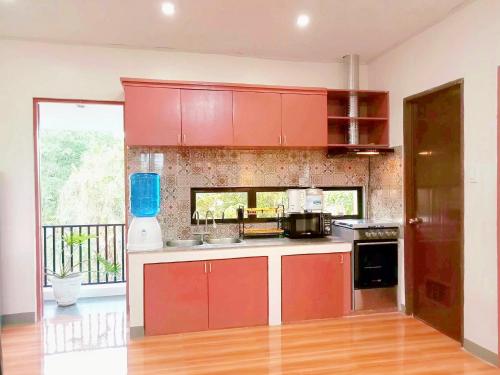 Retreat to a Stylish Flat w/ Balcony + Garden View in Liloan Retreat to a Stylish Flat w/ Balcony + Garden View in Liloan