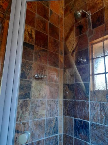 Chuveiro, Liphofung cave, chalets in Butha-Buthe Chuveiro, Liphofung cave, chalets in Butha-Buthe