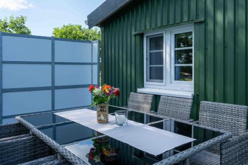 Erkély/terasz, Ferienwohnung Nordlande in Hattstedtermarsch Erkély/terasz, Ferienwohnung Nordlande in Hattstedtermarsch