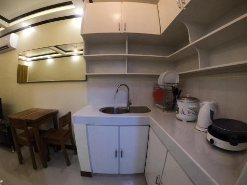 Kitchen, South Breeze Balibago 3 minutes away from Santa Rosa Commercial Complex in Santa Rosa Kitchen, South Breeze Balibago 3 minutes away from Santa Rosa Commercial Complex in Santa Rosa