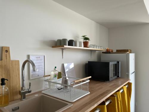 Közös társalgó / TV, Hózhó Tempo - Sous les pins, Bed & Breakfast écofriendly & slowlife avec sauna (Hozho Tempo - Sous les pins, Bed & Breakfast ecofriendly & slowlife avec sauna) in Bouglon Közös társalgó / TV, Hózhó Tempo - Sous les pins, Bed & Breakfast écofriendly & slowlife avec sauna (Hozho Tempo - Sous les pins, Bed & Breakfast ecofriendly & slowlife avec sauna) in Bouglon