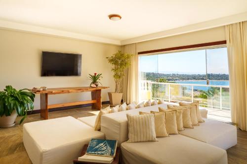 Shared lounge/TV area, Uni Boutique Hotel & Spa in Buzios Shared lounge/TV area, Uni Boutique Hotel & Spa in Buzios
