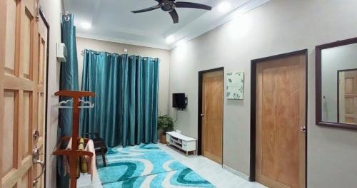 Shared lounge/TV area, Homestay Bonda Kota Bharu in Wakaf Bharu Shared lounge/TV area, Homestay Bonda Kota Bharu in Wakaf Bharu