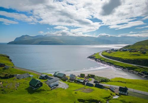 נוף, Sea & Mountain View 4 Bedroom in Hósvík נוף, Sea & Mountain View 4 Bedroom in Hósvík