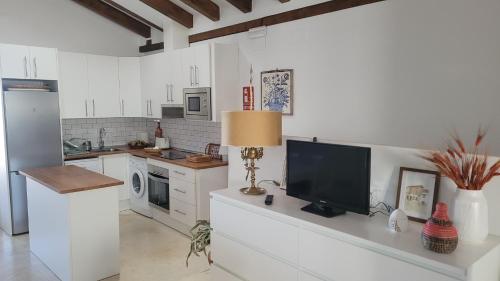 Közös társalgó / TV, La Casuca de La Vera in Valverde De La Vera Közös társalgó / TV, La Casuca de La Vera in Valverde De La Vera