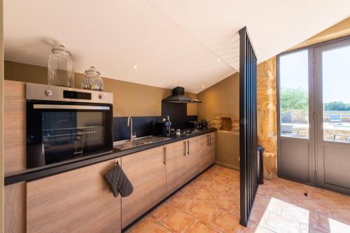 Konyha, Le Mas des Aracil 2 - Appt climatisé avec piscine (Le Mas des Aracil 2 - Appt climatise avec piscine) in Suze La Rousse Konyha, Le Mas des Aracil 2 - Appt climatisé avec piscine (Le Mas des Aracil 2 - Appt climatise avec piscine) in Suze La Rousse