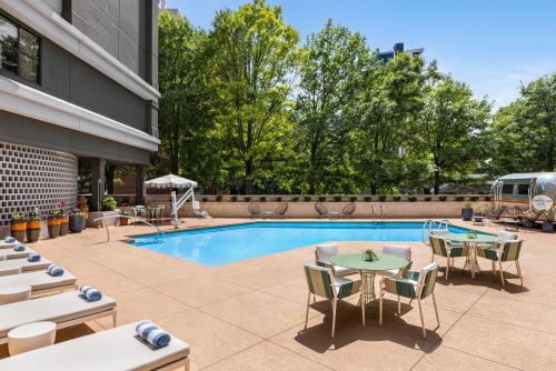 Swimming pool, The American Hotel Atlanta Downtown, Tapestry Collection by Hilton near Centennial Olympic Park Swimming pool, The American Hotel Atlanta Downtown, Tapestry Collection by Hilton near Centennial Olympic Park