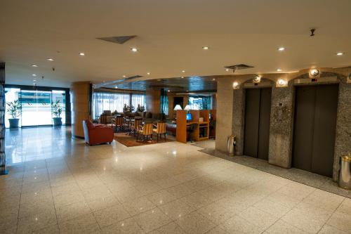 gedeelde lounge/tv-ruimte, Americas Benidorm Hotel in Rio De Janeiro gedeelde lounge/tv-ruimte, Americas Benidorm Hotel in Rio De Janeiro