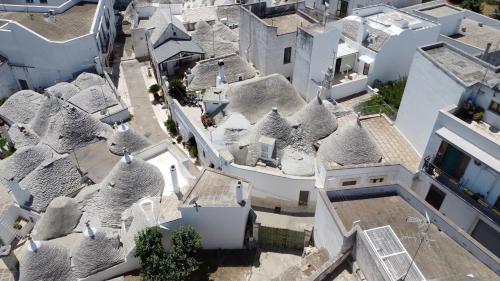 Vista exterior, Trulli Contento - Rooms & Apartments in Alberobello Vista exterior, Trulli Contento - Rooms & Apartments in Alberobello