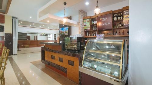 Bar/lounge, RedDoorz @ Nick Hotel Isabela in Aritao Bar/lounge, RedDoorz @ Nick Hotel Isabela in Aritao