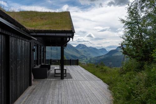 Terraza/balcón, Luxurious 5-Bedroom Mountain Chalet with Sauna, Panoramic Views, and Two Full Bathrooms in Stranda Terraza/balcón, Luxurious 5-Bedroom Mountain Chalet with Sauna, Panoramic Views, and Two Full Bathrooms in Stranda