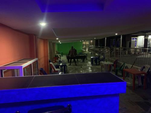 Ресторан, M&A Royal Guest House & Bar in Бенін Ресторан, M&A Royal Guest House & Bar in Бенін