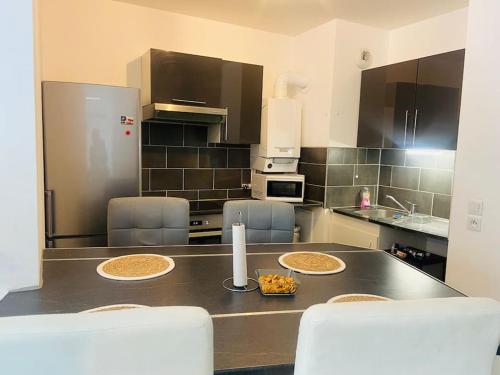 Faciliteiten, Confort appart entre Paris & Aéroport Charles de Gaulle (Confort appart entre Paris & Aeroport Charles de Gaulle) in Goussainville Faciliteiten, Confort appart entre Paris & Aéroport Charles de Gaulle (Confort appart entre Paris & Aeroport Charles de Gaulle) in Goussainville