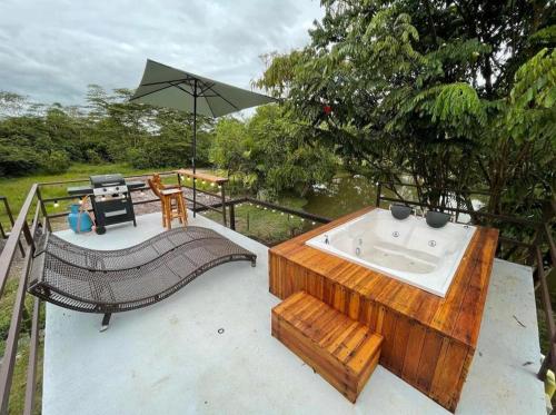 Hot tub, Glamping Villas del Llano in La Palmera Hot tub, Glamping Villas del Llano in La Palmera