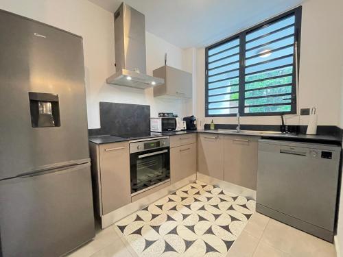 مطبخ, Le Petit Colibri - Jardin 80m2 et espace de travail in Remire-Montjoly مطبخ, Le Petit Colibri - Jardin 80m2 et espace de travail in Remire-Montjoly