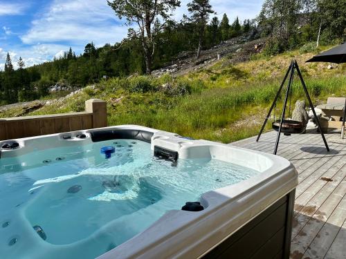 Hot tub, Flott moderne hytte i Holterdalen, 4 soverom, 2 bad, Jacuzzi, garasje in Rauland Hot tub, Flott moderne hytte i Holterdalen, 4 soverom, 2 bad, Jacuzzi, garasje in Rauland
