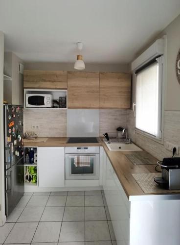 Appartement avec terrasse proche gare RER in Moissy-Cramayel Appartement avec terrasse proche gare RER in Moissy-Cramayel