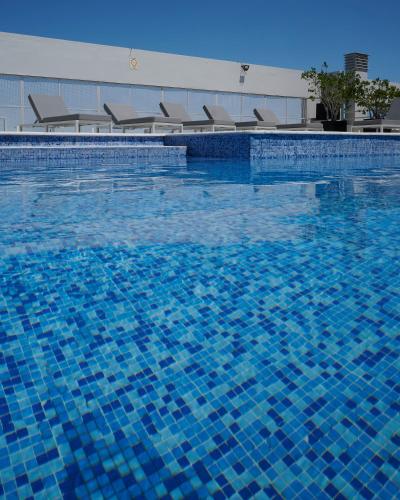 Swimming pool, Plaza Real Suites Hotel in Centro Swimming pool, Plaza Real Suites Hotel in Centro