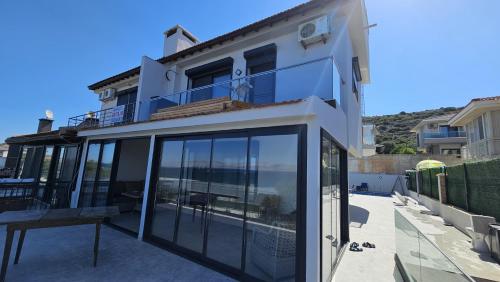 Çeşmede Denize Sıfır Villa (Cesmede Denize Sıfır Villa) in Ciftlik Koyu Ciftlikkoy Çeşmede Denize Sıfır Villa (Cesmede Denize Sıfır Villa) in Ciftlik Koyu Ciftlikkoy