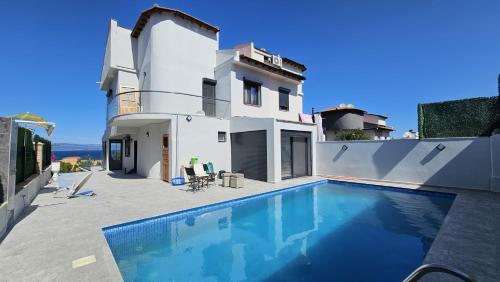 Çeşmede Denize Sıfır Villa (Cesmede Denize Sıfır Villa) in Ciftlik Koyu Ciftlikkoy Çeşmede Denize Sıfır Villa (Cesmede Denize Sıfır Villa) in Ciftlik Koyu Ciftlikkoy