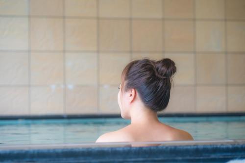 Hot spring bath, Hakuba Hospitality Inn YUKINOSO in Hakuba Hot spring bath, Hakuba Hospitality Inn YUKINOSO in Hakuba