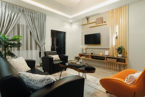 Felles stue/TV-område, 2 bedroom Greys apartment Gwarimpa in Abuja Felles stue/TV-område, 2 bedroom Greys apartment Gwarimpa in Abuja