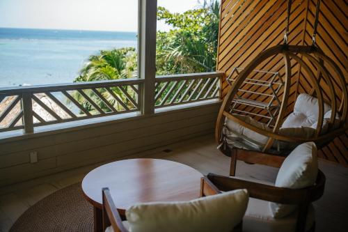 Erkély/terasz, TRANQUILSEAS ECO LODGE & DIVE CENTER in Sandy Bay Erkély/terasz, TRANQUILSEAS ECO LODGE & DIVE CENTER in Sandy Bay