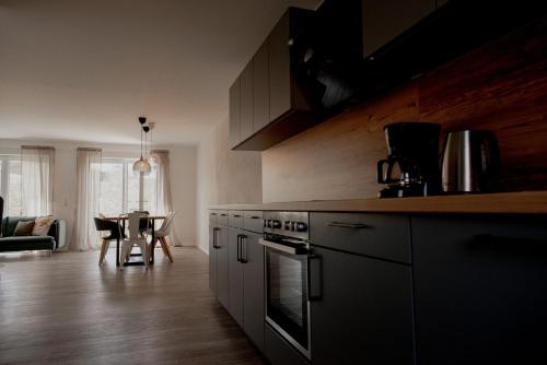 مطبخ, Ferienhaus am Mühlenweiher im Allgäu (Ferienhaus am Muhlenweiher im Allgau) in Leutkirch Im Allgau مطبخ, Ferienhaus am Mühlenweiher im Allgäu (Ferienhaus am Muhlenweiher im Allgau) in Leutkirch Im Allgau