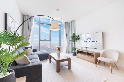 Shared lounge/TV area, Premium Home with Full Sea View in Dubai Maritime City Shared lounge/TV area, Premium Home with Full Sea View in Dubai Maritime City