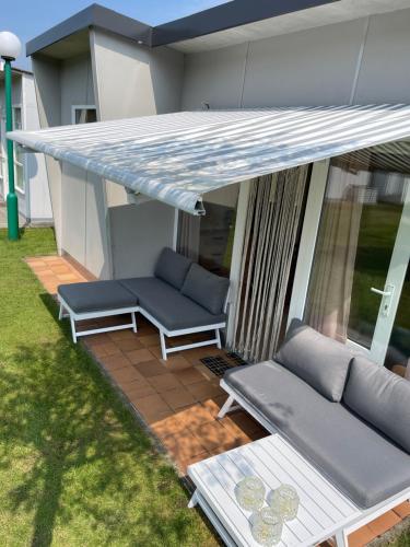 Rustig vakantiehuisje Coester De Haan - 2 slaapkamers in เดอร์ ฮาน Rustig vakantiehuisje Coester De Haan - 2 slaapkamers in เดอร์ ฮาน