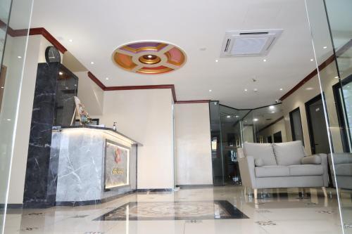 Előcsarnok, Capital O 90897 Island City Hotel near Pinang Peranakan-ház Előcsarnok, Capital O 90897 Island City Hotel near Pinang Peranakan-ház