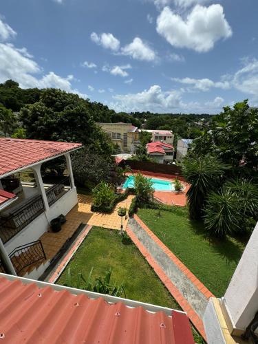 Garden, La Canopee Enchantee, chambres d'hotes, piscine, proche aeroport, Gare maritime in Les Abymes Garden, La Canopee Enchantee, chambres d'hotes, piscine, proche aeroport, Gare maritime in Les Abymes