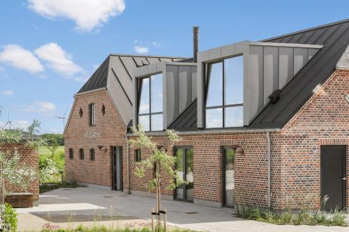 Vista exterior, Møllegården Apartment Hotel with Yoga, Panorama-Sauna & Coworking Space (Møllegarden Apartment Hotel with Yoga, Panorama-Sauna & Coworking Space) in Ringkobing Vista exterior, Møllegården Apartment Hotel with Yoga, Panorama-Sauna & Coworking Space (Møllegarden Apartment Hotel with Yoga, Panorama-Sauna & Coworking Space) in Ringkobing