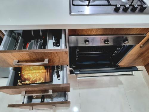 Cocina, COSTA APPART -3min Plage- Netflix-Piscine-Climat in Bouznika Cocina, COSTA APPART -3min Plage- Netflix-Piscine-Climat in Bouznika