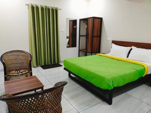 شقة متر مربع من 2 غرفة و2 حمام خاص في ثاتليكاد (Erumaadam Bamboo Suite @ Merlys Fruit Garden) in Thattakad شقة متر مربع من 2 غرفة و2 حمام خاص في ثاتليكاد (Erumaadam Bamboo Suite @ Merlys Fruit Garden) in Thattakad