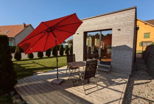 Балкон/терраса, TinyHouse - (D)ein Ferienhaus in Руггелль Балкон/терраса, TinyHouse - (D)ein Ferienhaus in Руггелль
