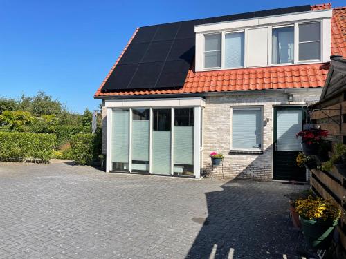 Genieten in een luxe vakantiewoning, dichtbij het IJsselmeer en strand in Warns Genieten in een luxe vakantiewoning, dichtbij het IJsselmeer en strand in Warns