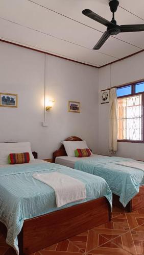 Khamphouy Guesthouse in Champasak Khamphouy Guesthouse in Champasak