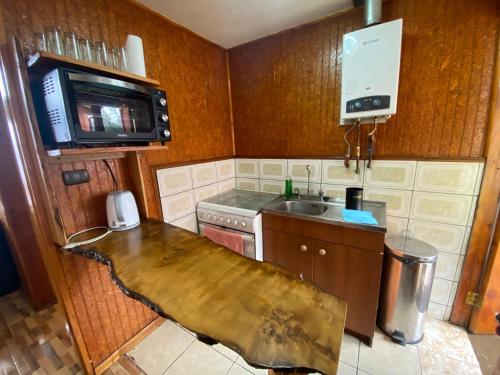 Konyha, Cabañas San Sebastián (Cabanas San Sebastian) in Angachilla Konyha, Cabañas San Sebastián (Cabanas San Sebastian) in Angachilla