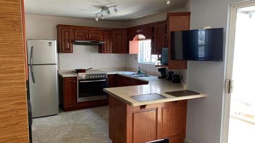 Konyha, Spacious 4-bedroom house in beautiful Ciudad General Escobedo with WiFi, AC in Cumbres Konyha, Spacious 4-bedroom house in beautiful Ciudad General Escobedo with WiFi, AC in Cumbres