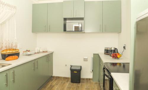 Kitchen, Rainbow Palace in Bloemfontein Kitchen, Rainbow Palace in Bloemfontein