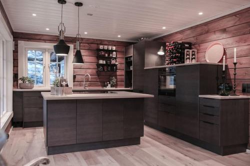 Tømmerhus i Geiranger Sentrum med panorama utsikt in Stranda Tømmerhus i Geiranger Sentrum med panorama utsikt in Stranda