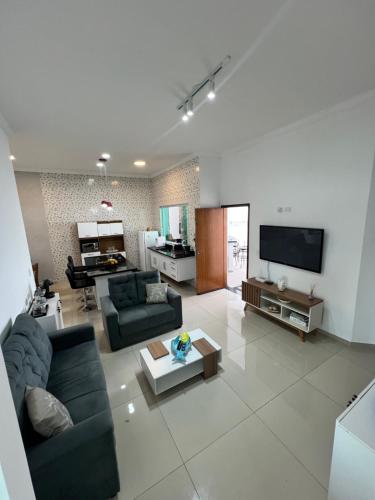 공용 라운지/TV 시청 구역, Casa com piscina, 700M da praia in 에스탄시아 상 조르주 공용 라운지/TV 시청 구역, Casa com piscina, 700M da praia in 에스탄시아 상 조르주