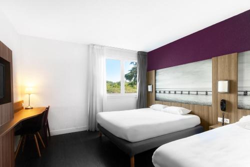 Вітальня, Brit Hotel Montpellier Parc Expo in Пероль Вітальня, Brit Hotel Montpellier Parc Expo in Пероль