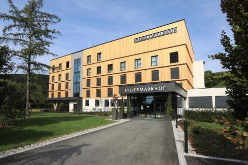 Exterior view, Hotel Steiermarkhof Graz - Aus Holz gebaut, von Hugeln gekusst in Wetzelsdorf Exterior view, Hotel Steiermarkhof Graz - Aus Holz gebaut, von Hugeln gekusst in Wetzelsdorf
