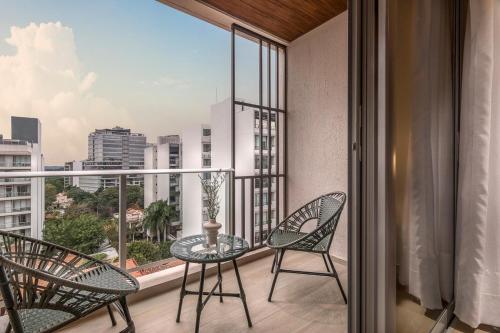 Terraza/balcón, HOUZE - Stay & Residences by AVA in Asunción Terraza/balcón, HOUZE - Stay & Residences by AVA in Asunción